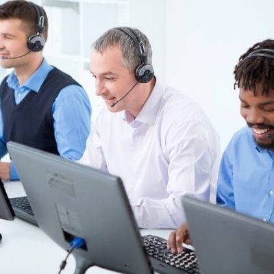 Group of customer service representatives. Vitabyte's customer service representatives at work sitting in a row.